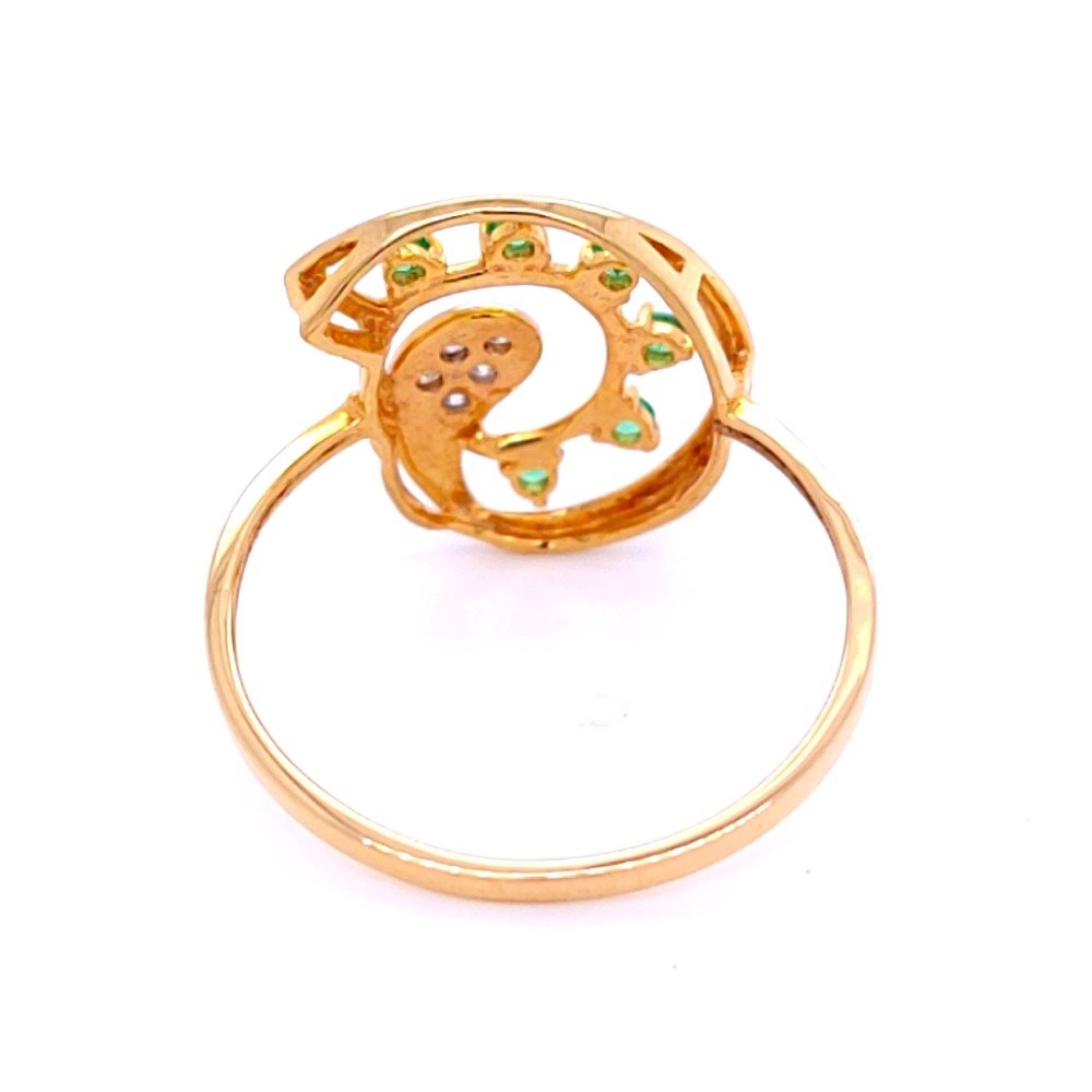 Fancy gold ring with natural diamond and colored stones.