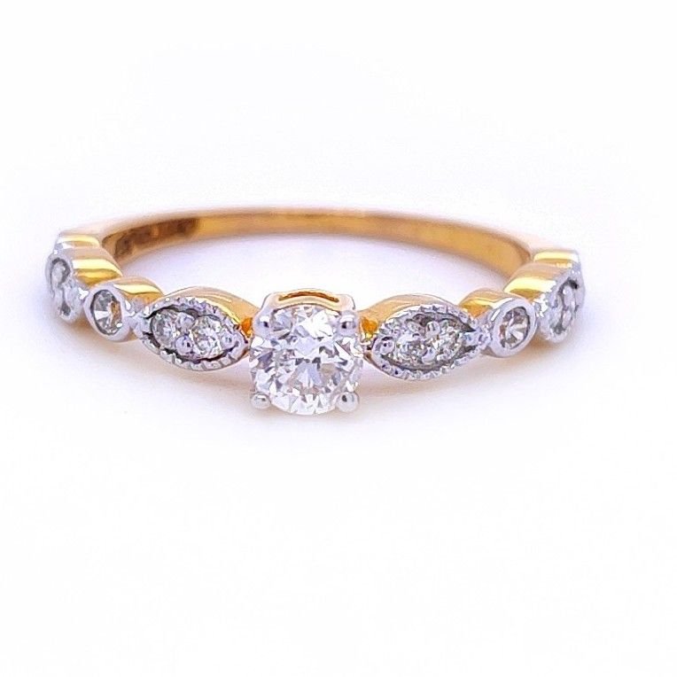 Vintage style solitaire diamond engagement ring